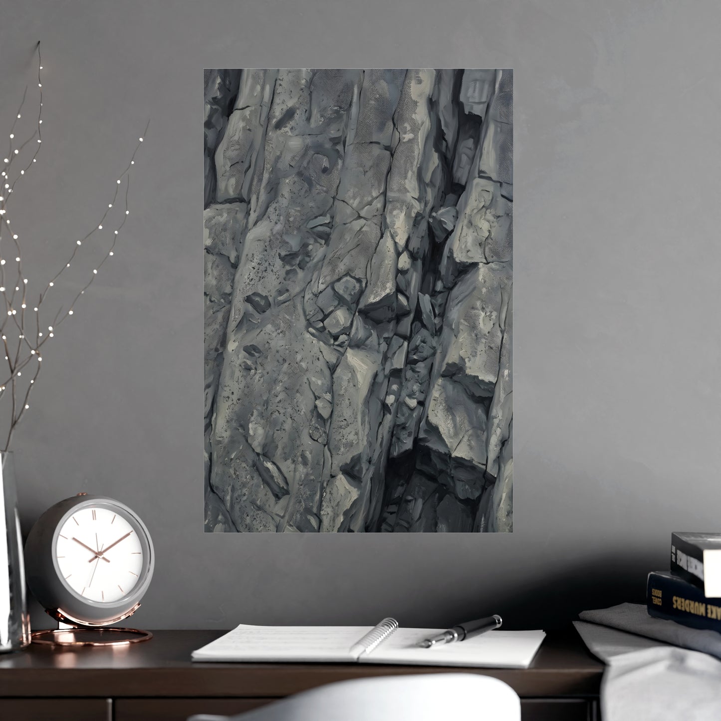 Rock Face hung above a desk with a clock and notebook, 18x24 in print