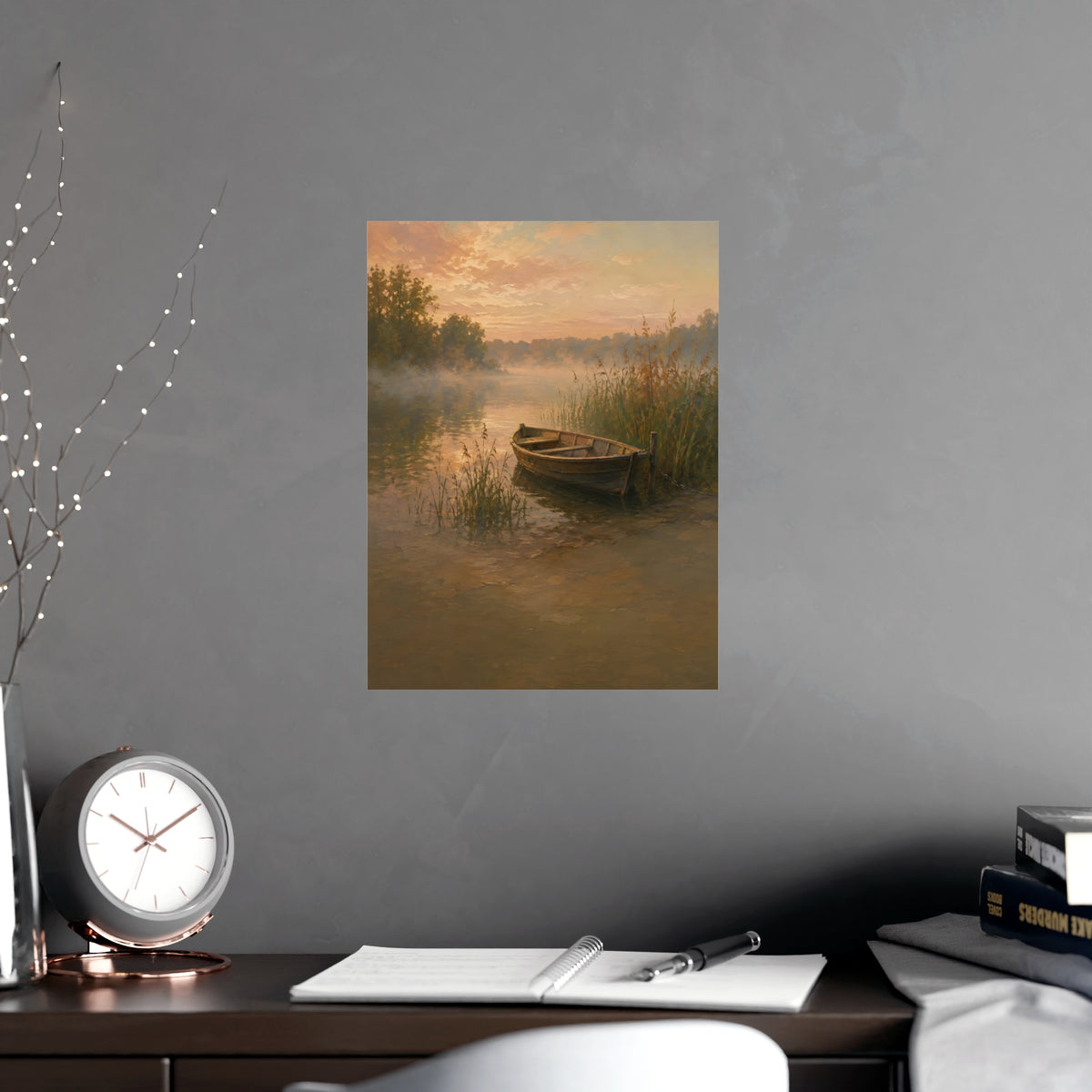 Rowboat at Dawn — a wooden rowboat moored among reeds as mist rises off the water, shown framed on a wall