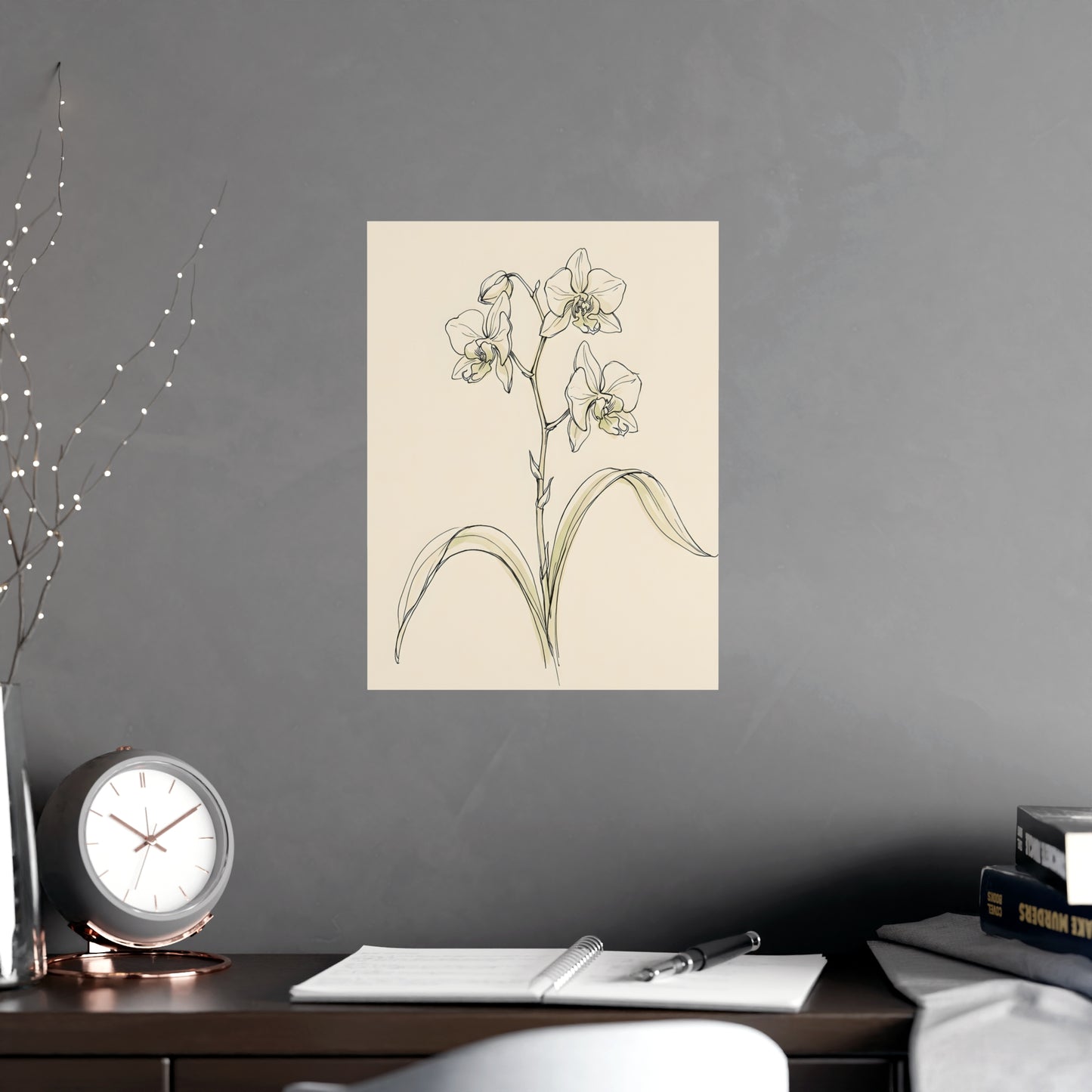 Orchid hung on a grey wall above a dark sofa, 12x18 in print