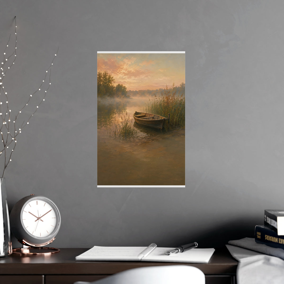 Rowboat at Dawn — a wooden rowboat moored among reeds as mist rises off the water, shown framed on a wall