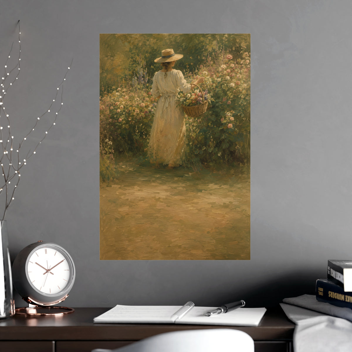 Gathering Flowers — a woman in a straw hat gathering flowers into a wicker basket, shown framed on a wall