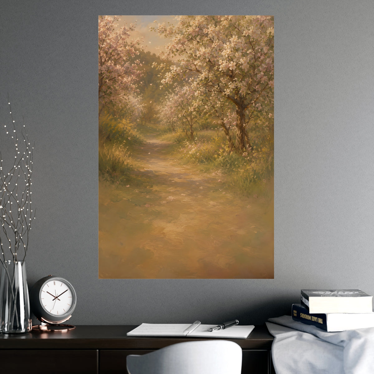 Orchard Path in Spring — a quiet orchard path with blossom drifting, shown framed on a wall