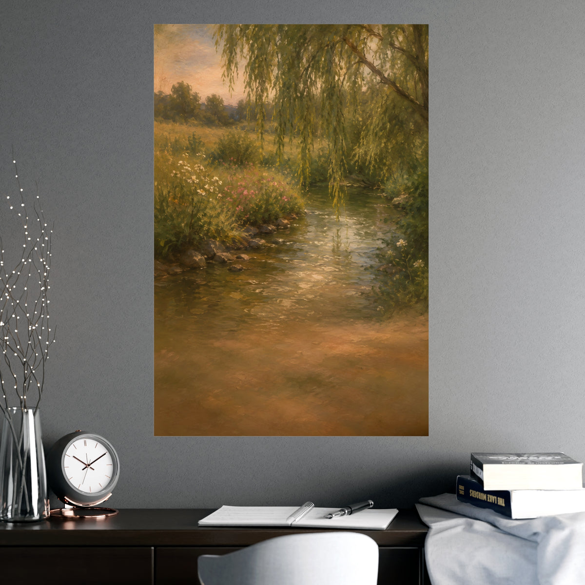 Willow Stream — a shallow stream winding through a meadow with willow branches trailing over the water, shown framed on a wal