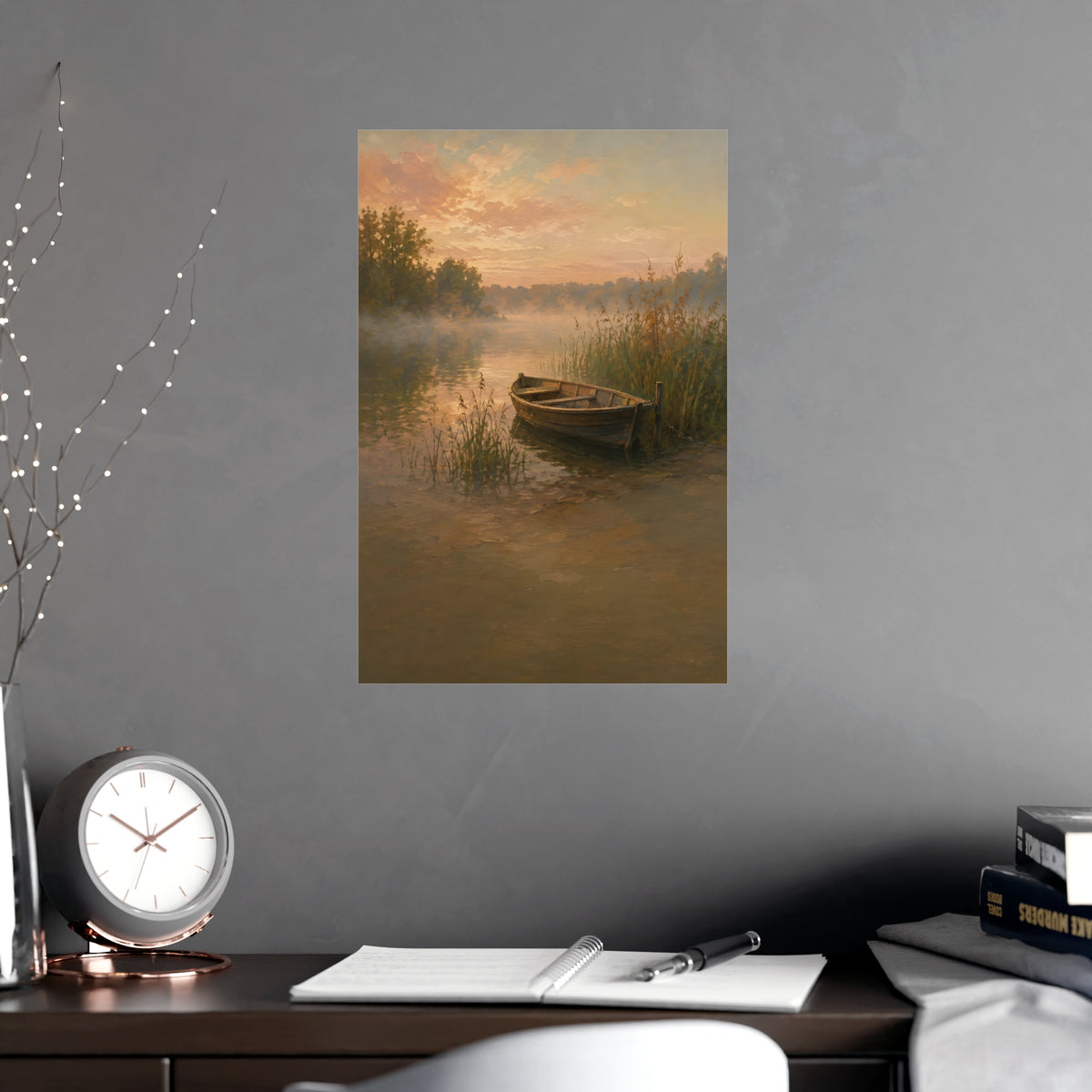 Rowboat at Dawn — a wooden rowboat moored among reeds as mist rises off the water, shown framed on a wall