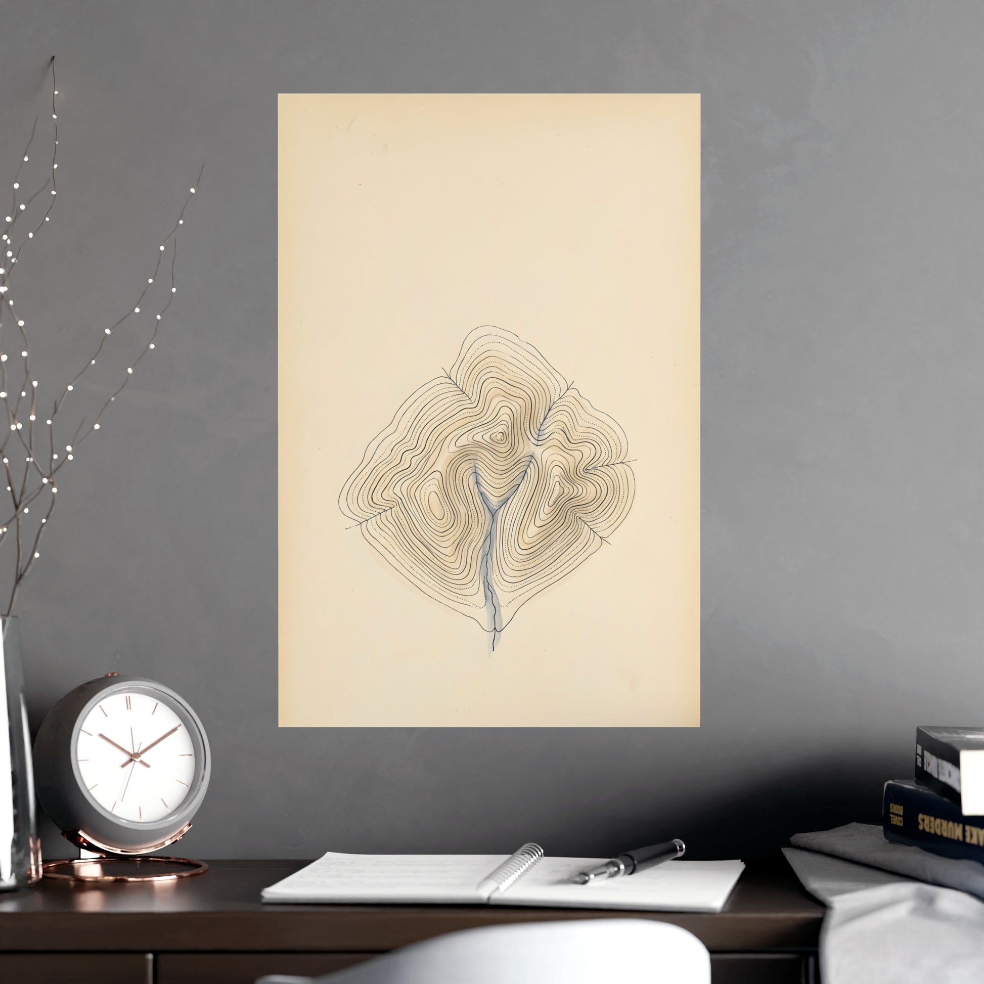 Contour Lines hung above a sofa with a side table and lilies, 18x24 in print