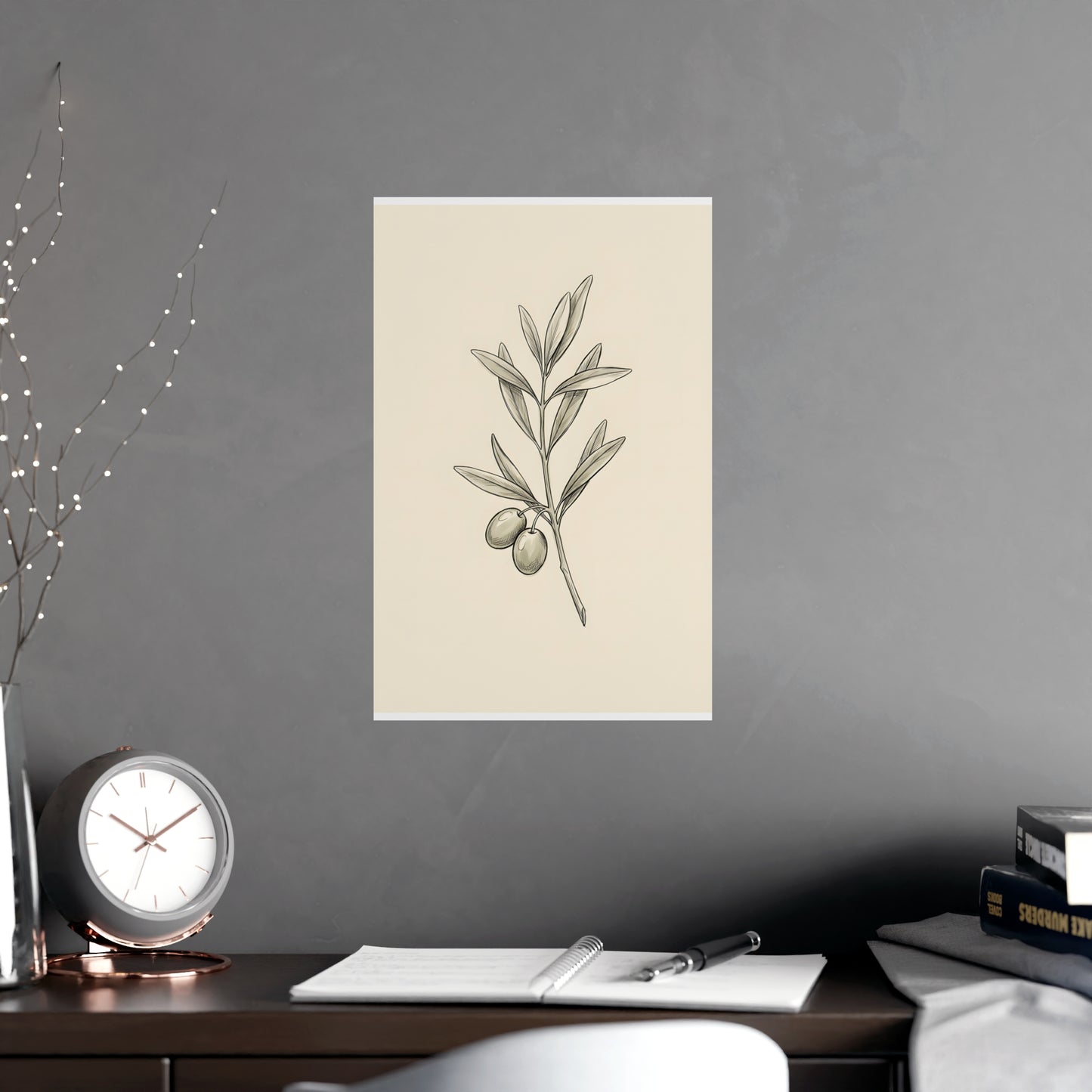 Olive Branch hung above a desk with a clock and notebook, 11x17 in print