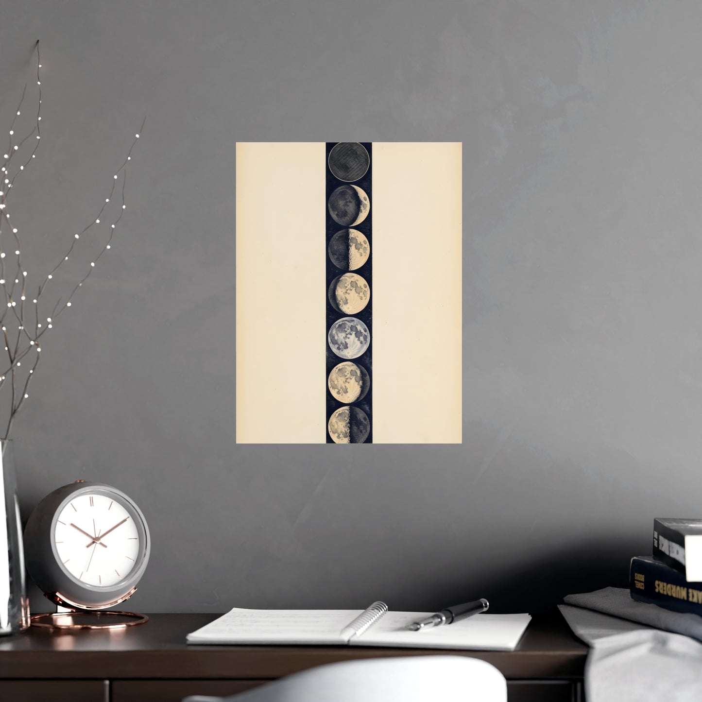 Phases of the Moon hung on a grey wall above a dark sofa, 12x18 in print