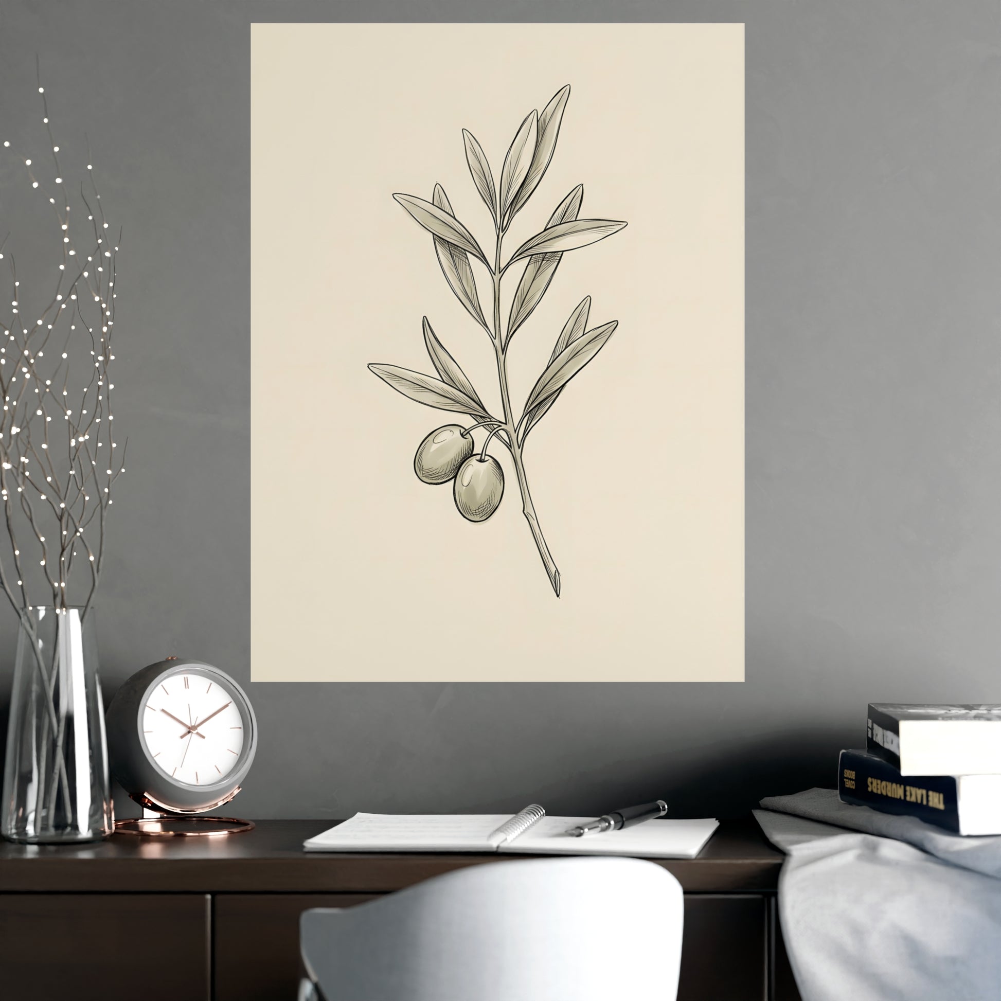 Olive Branch hung on a grey wall above a dark sofa, 18x24 in print