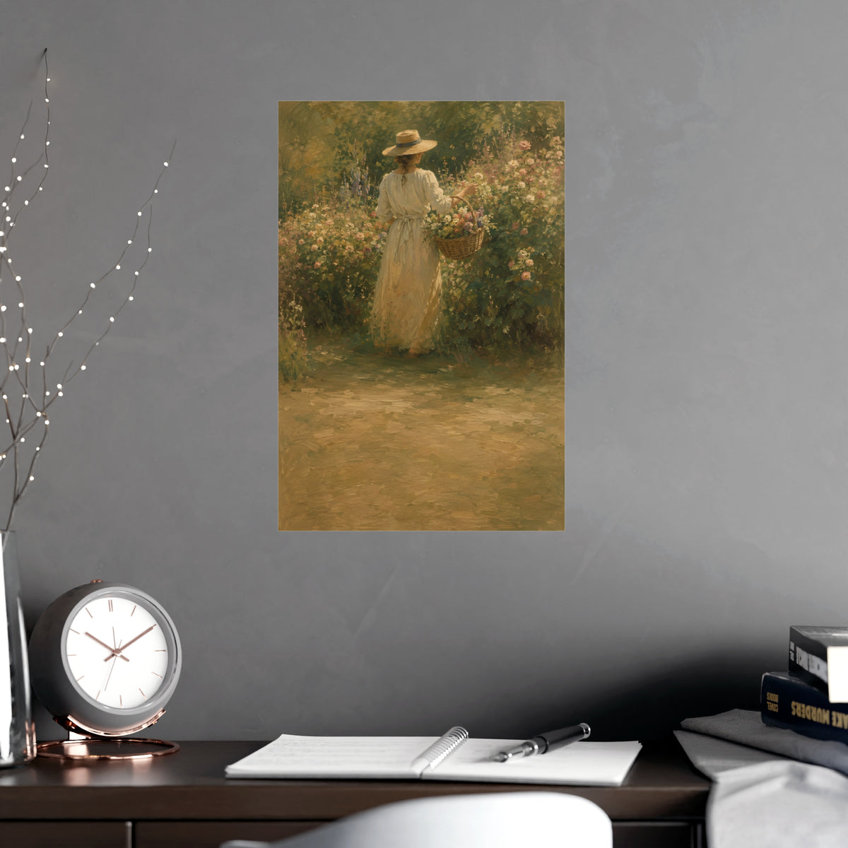 Gathering Flowers — a woman in a straw hat gathering flowers into a wicker basket, shown framed on a wall
