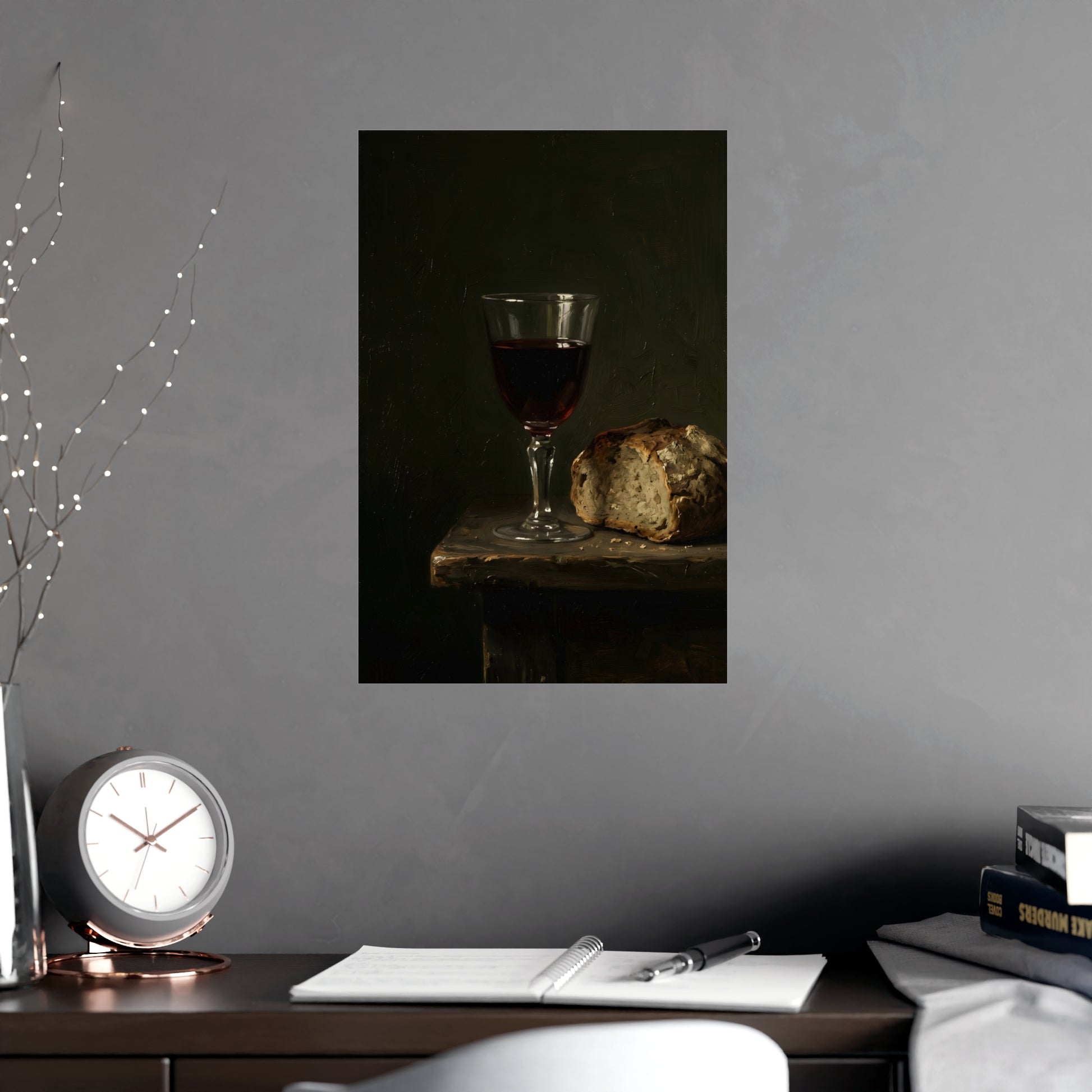 Wine and Bread hung on a grey wall above a dark sofa, 12x18 in print