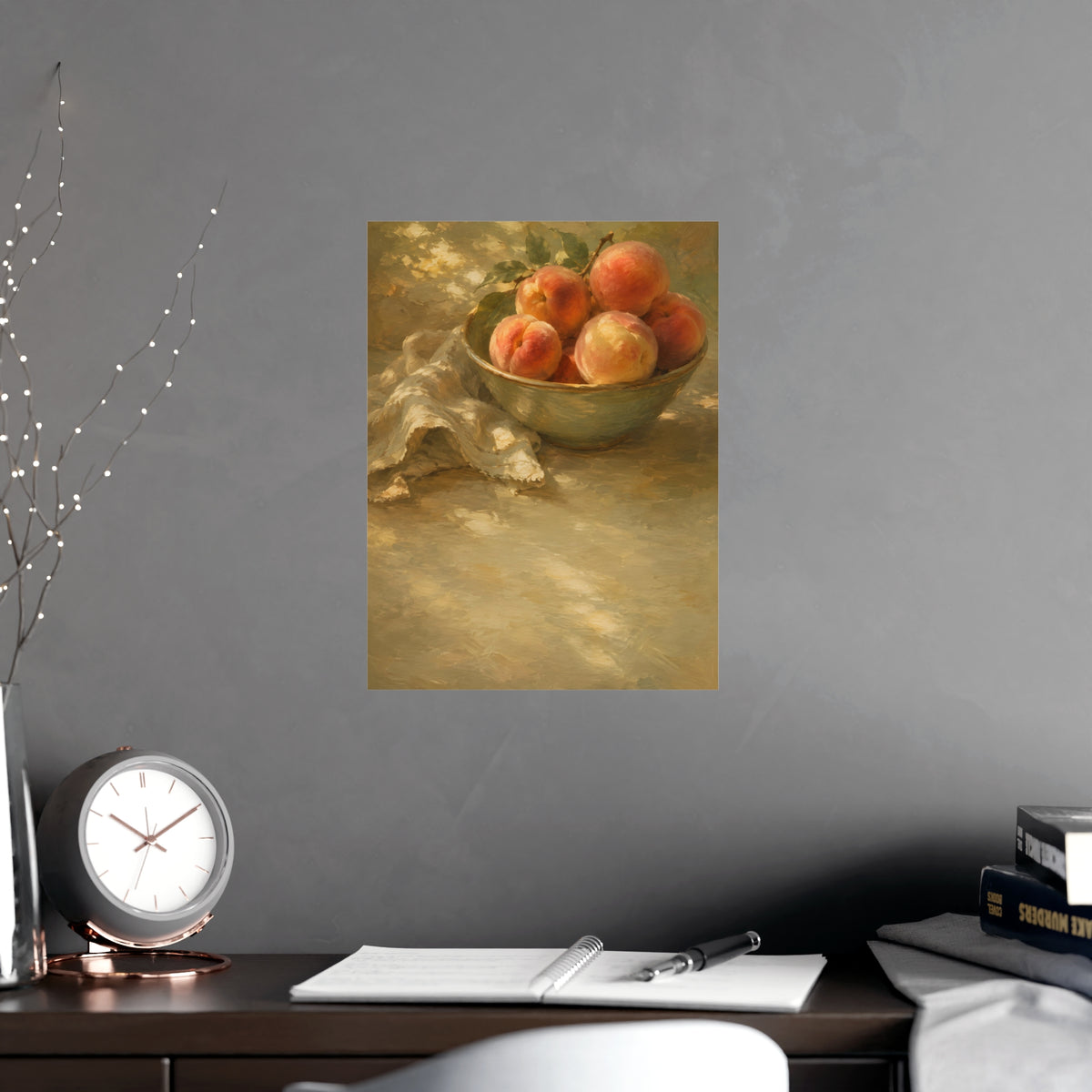 Bowl of Peaches — a bowl of ripe peaches and a folded linen napkin on a sunlit table, shown framed on a wall