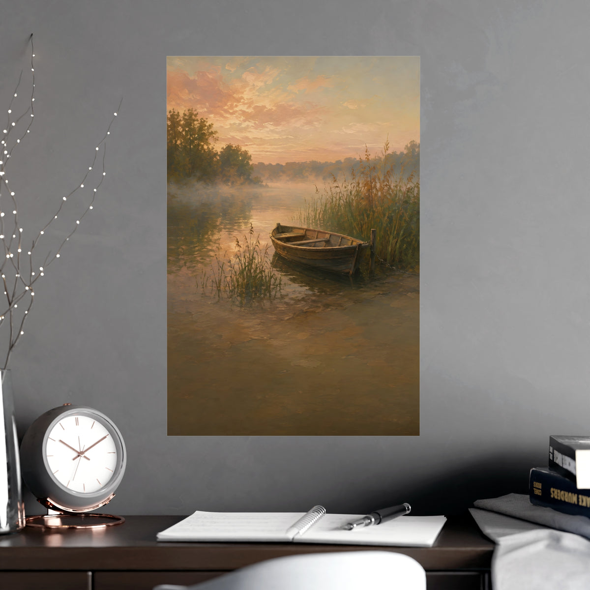 Rowboat at Dawn — a wooden rowboat moored among reeds as mist rises off the water, shown framed on a wall