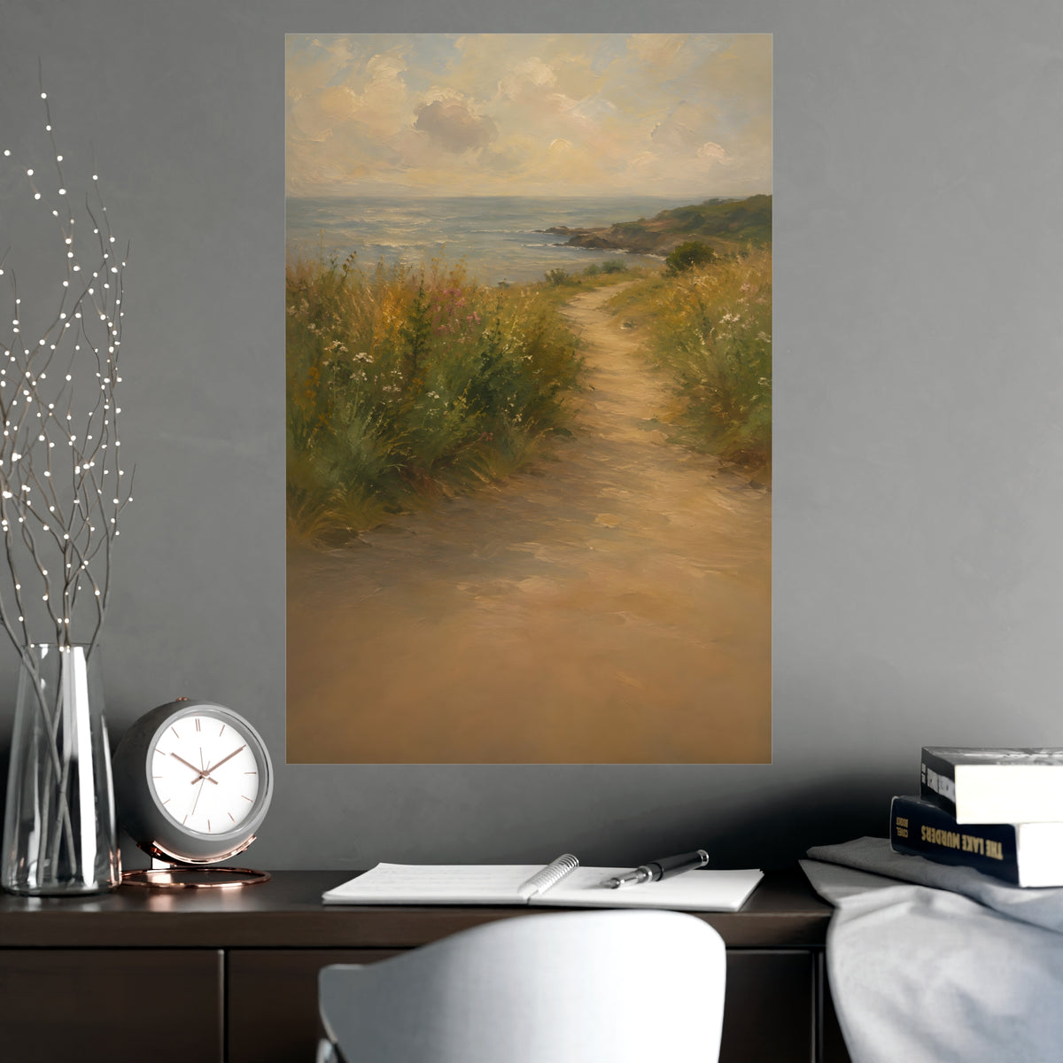 Coast Path — a sandy path through wild grasses and sea pinks with a calm sea beyond, shown framed on a wall