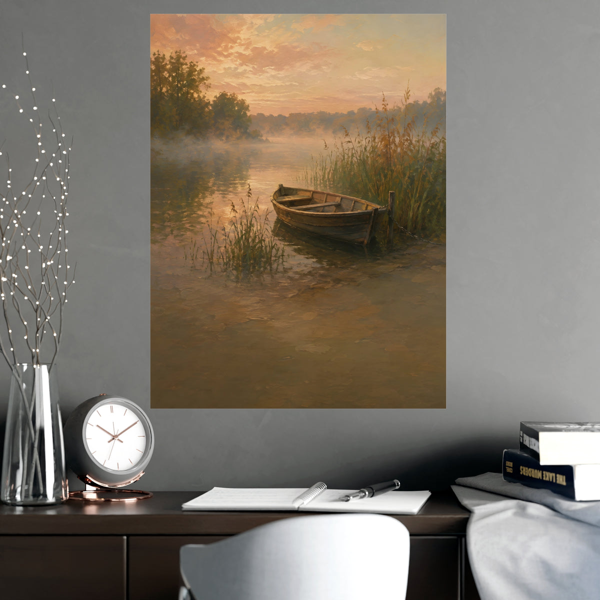 Rowboat at Dawn — a wooden rowboat moored among reeds as mist rises off the water, shown framed on a wall