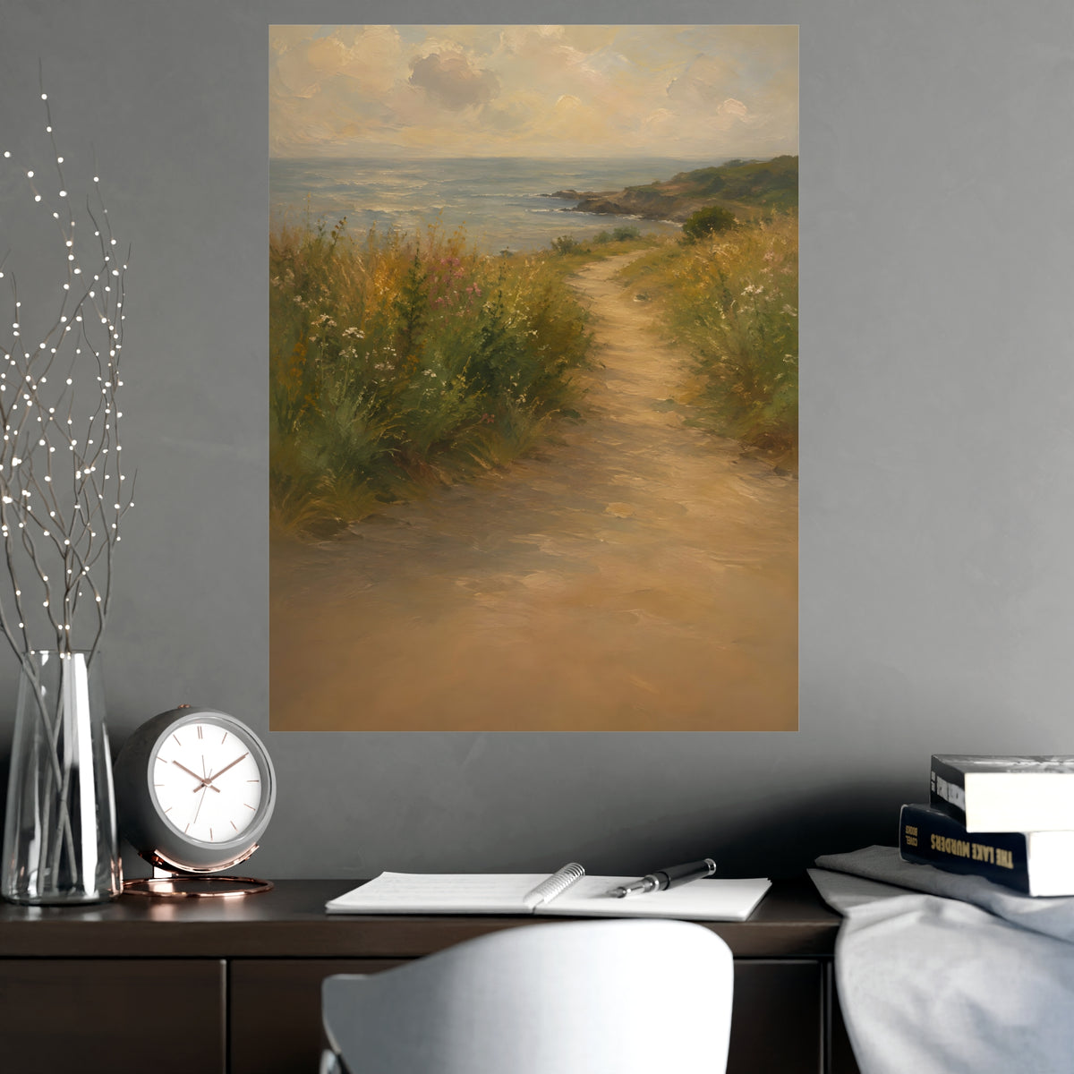 Coast Path — a sandy path through wild grasses and sea pinks with a calm sea beyond, shown framed on a wall