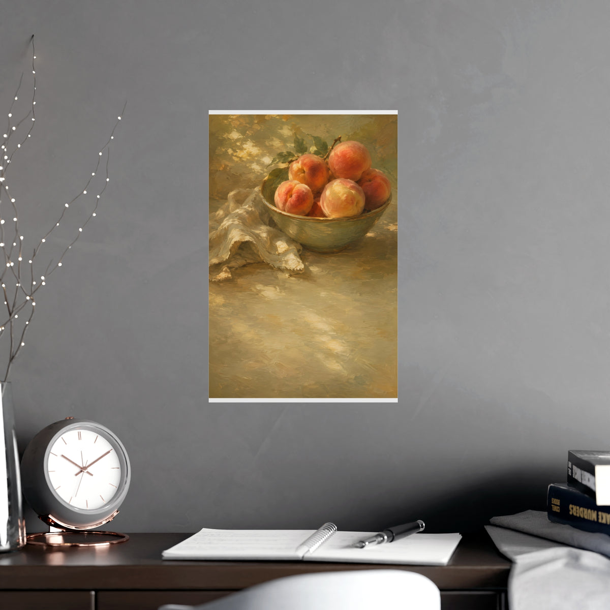 Bowl of Peaches — a bowl of ripe peaches and a folded linen napkin on a sunlit table, shown framed on a wall