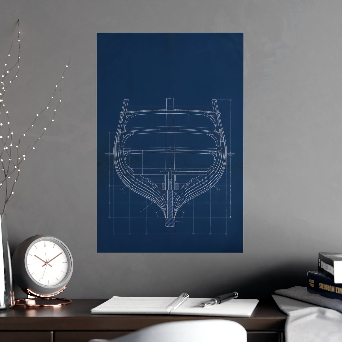 Ship's Hull hung above a desk with a clock and notebook, 18x24 in print