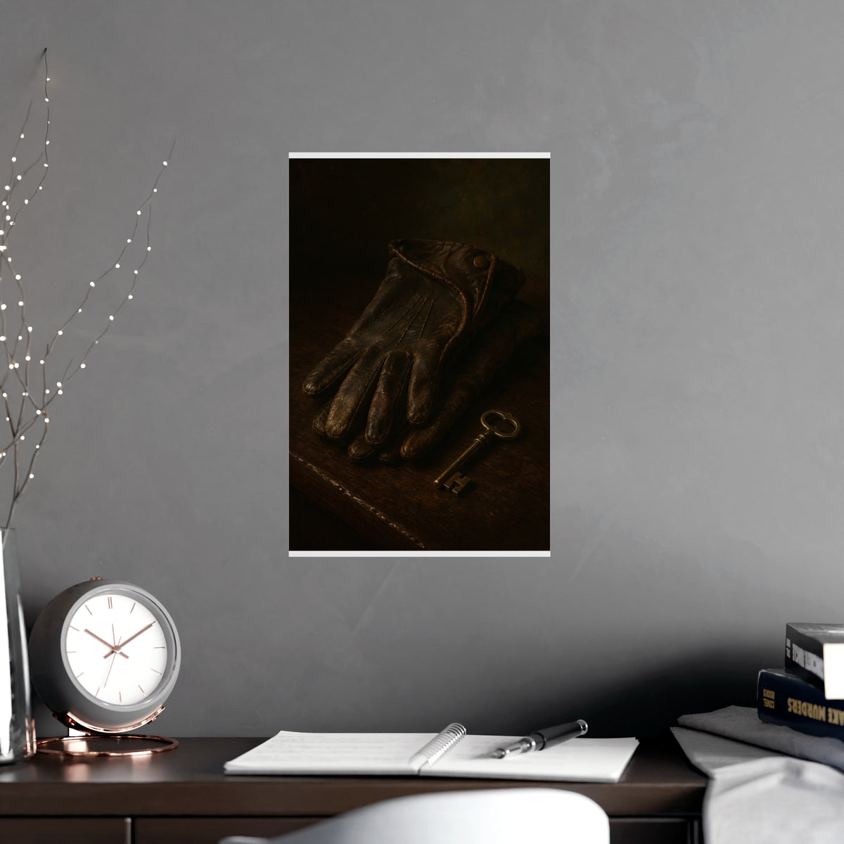 Gloves and a Brass Key — gloves and a brass key, shown framed on a wall