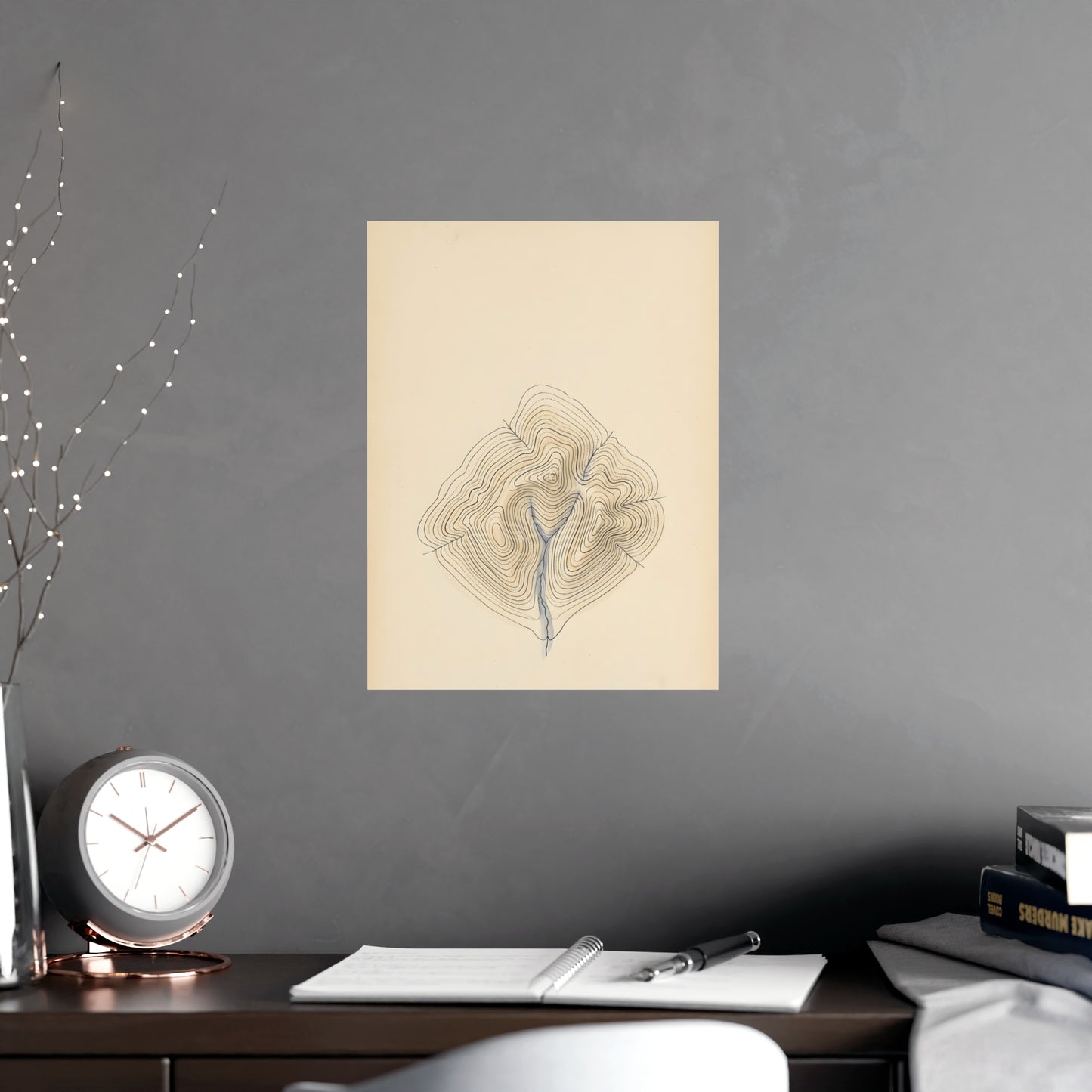 Contour Lines hung above a desk with a clock and notebook, 12x18 in print