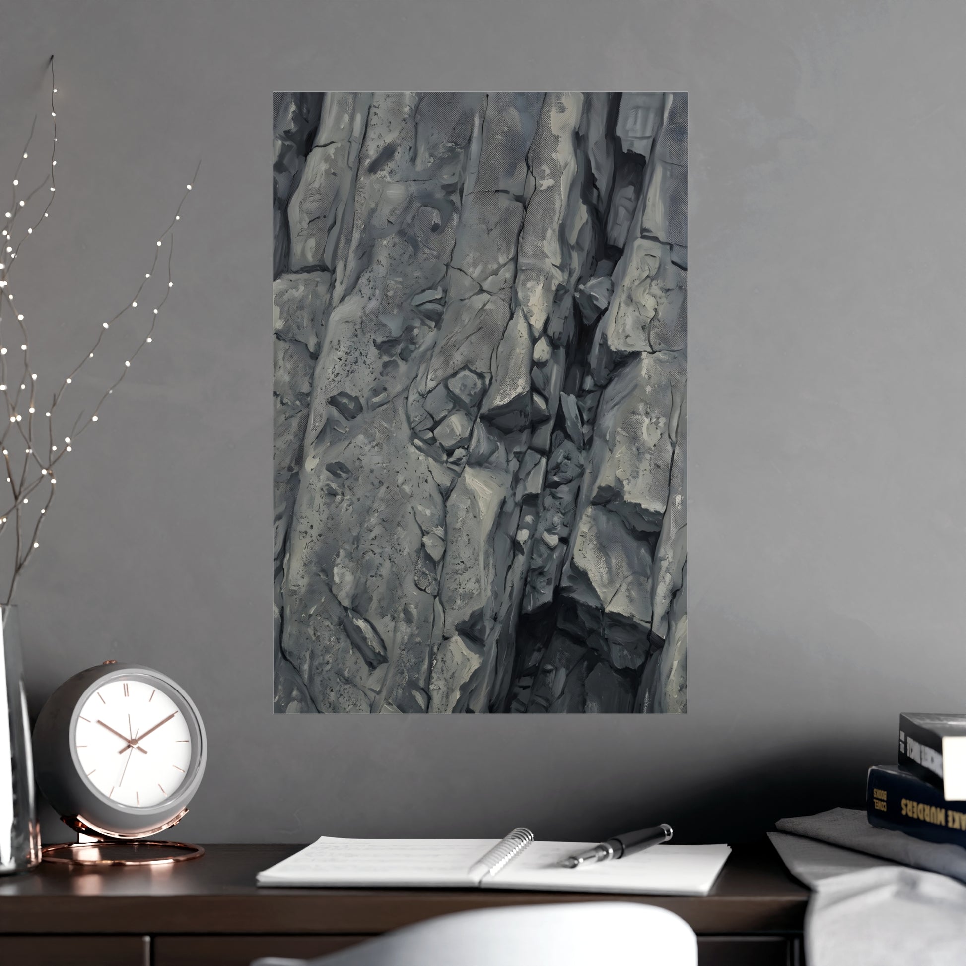 Rock Face hung above a desk with a clock and notebook, 18x24 in print