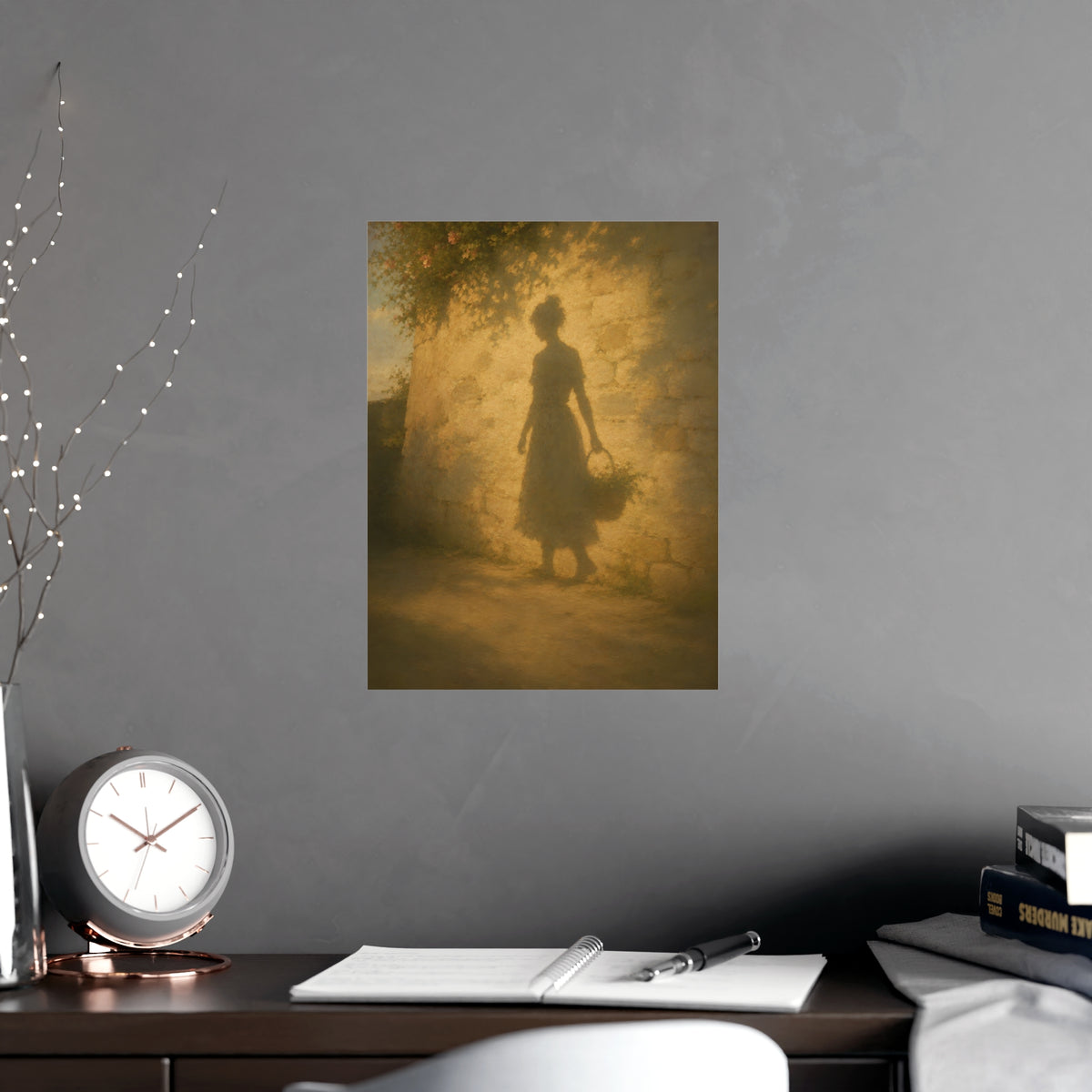 Her Shadow on the Wall — the long shadow of a woman carrying a basket, cast across a sunlit stone wall, shown framed on a wal