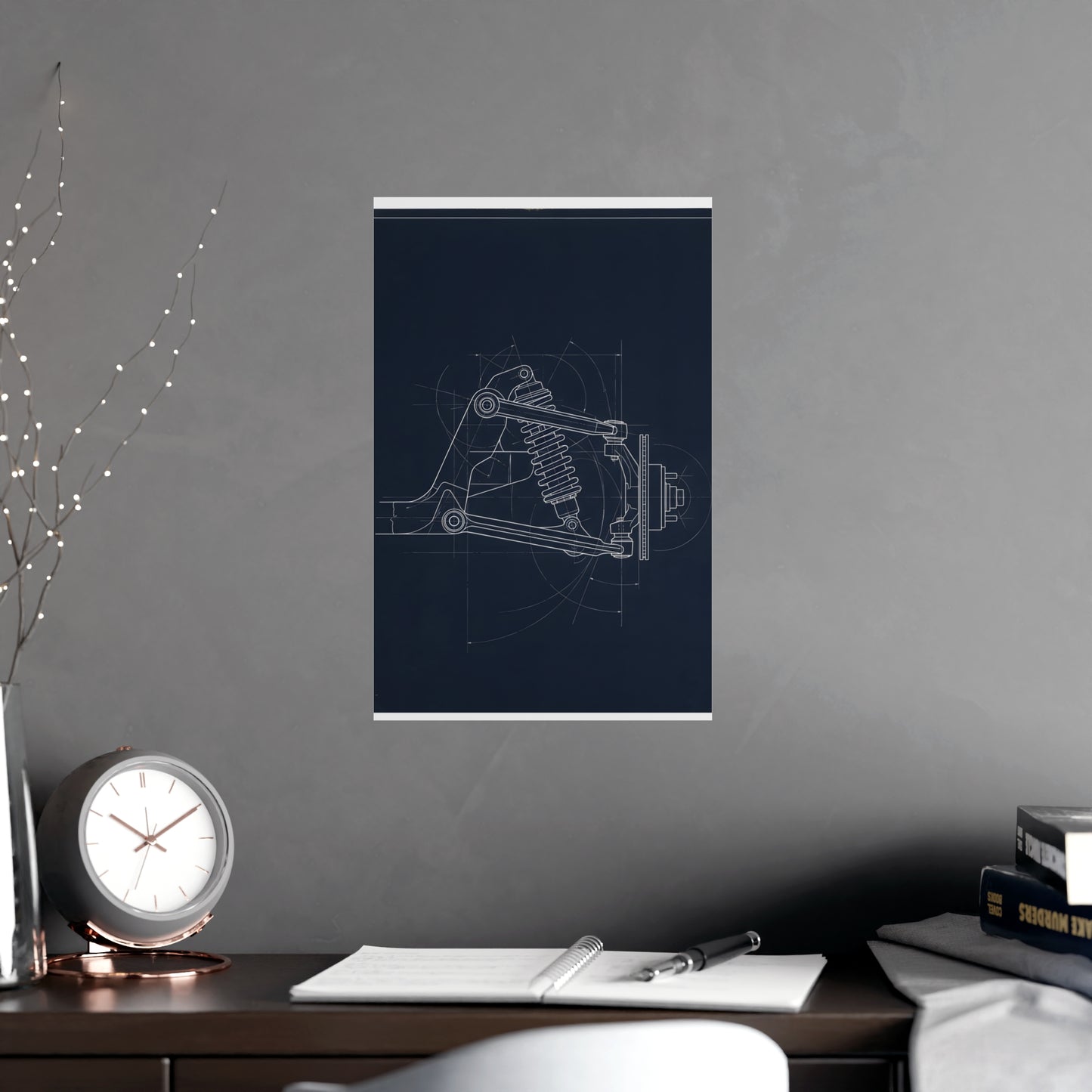 Double Wishbone hung above a desk with a clock and notebook, 11x17 in print