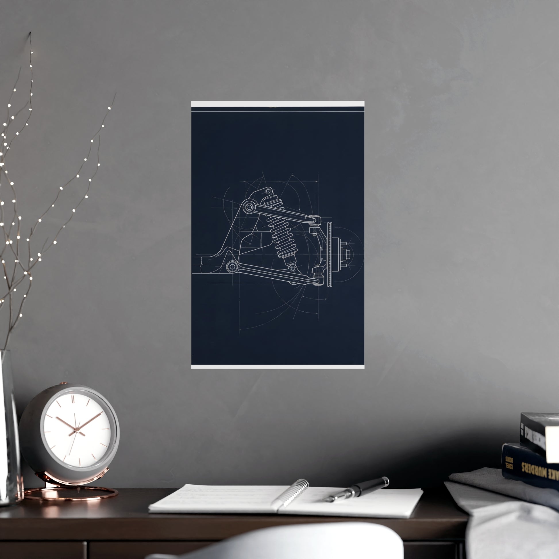 Double Wishbone hung above a desk with a clock and notebook, 11x17 in print