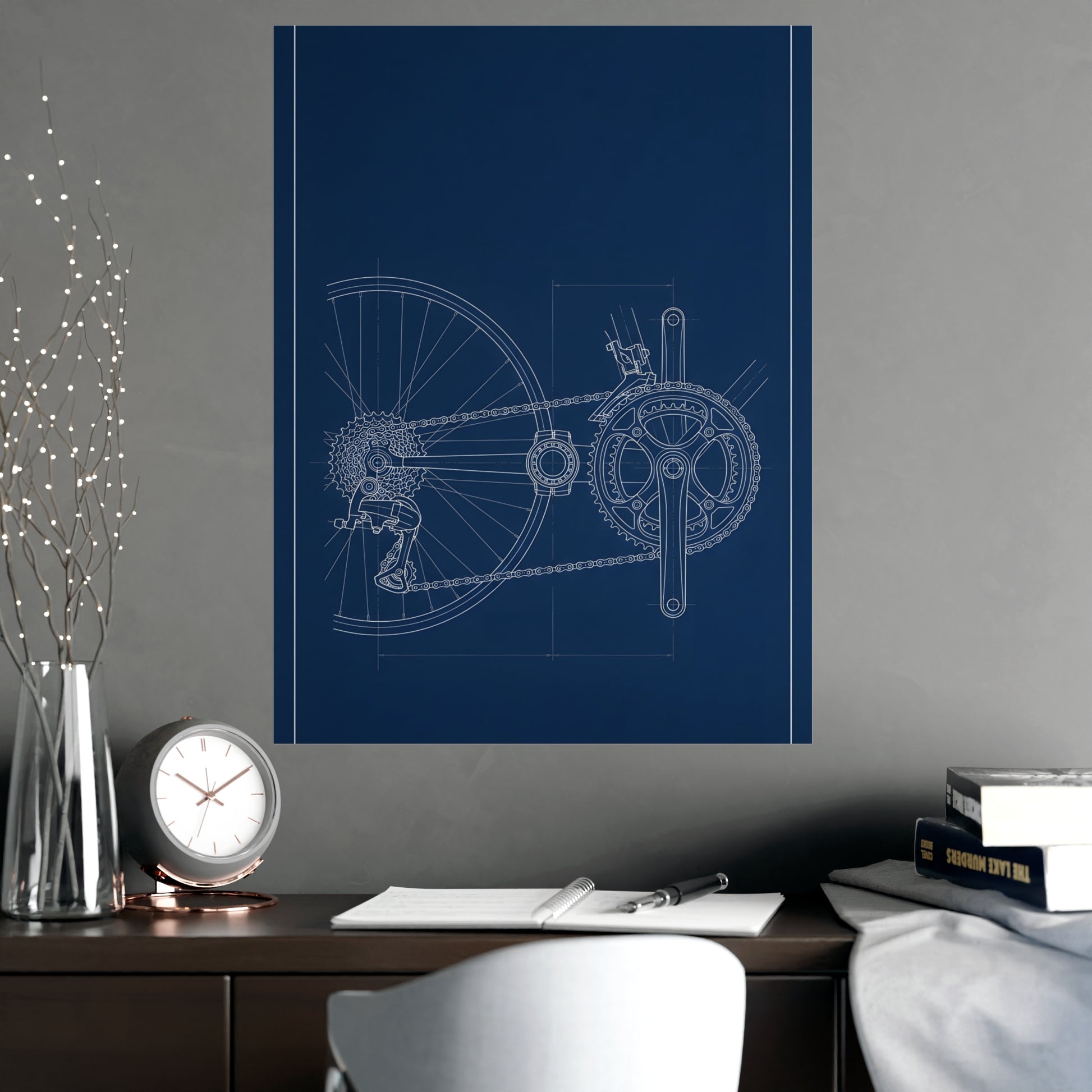 Drivetrain hung above a desk with a clock and notebook, 18x24 in print