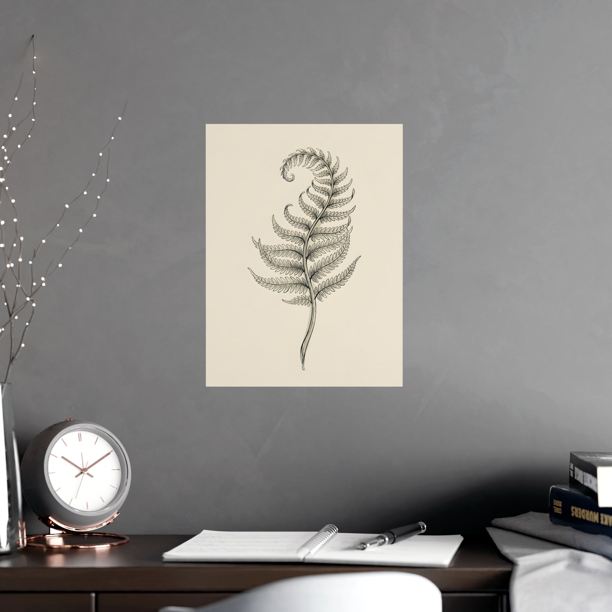 Fern Frond hung above a desk with a clock and notebook, 12x16 in print