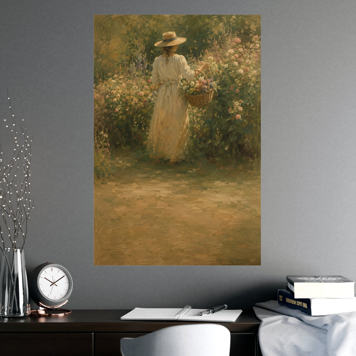 Gathering Flowers — a woman in a straw hat gathering flowers into a wicker basket, shown framed on a wall