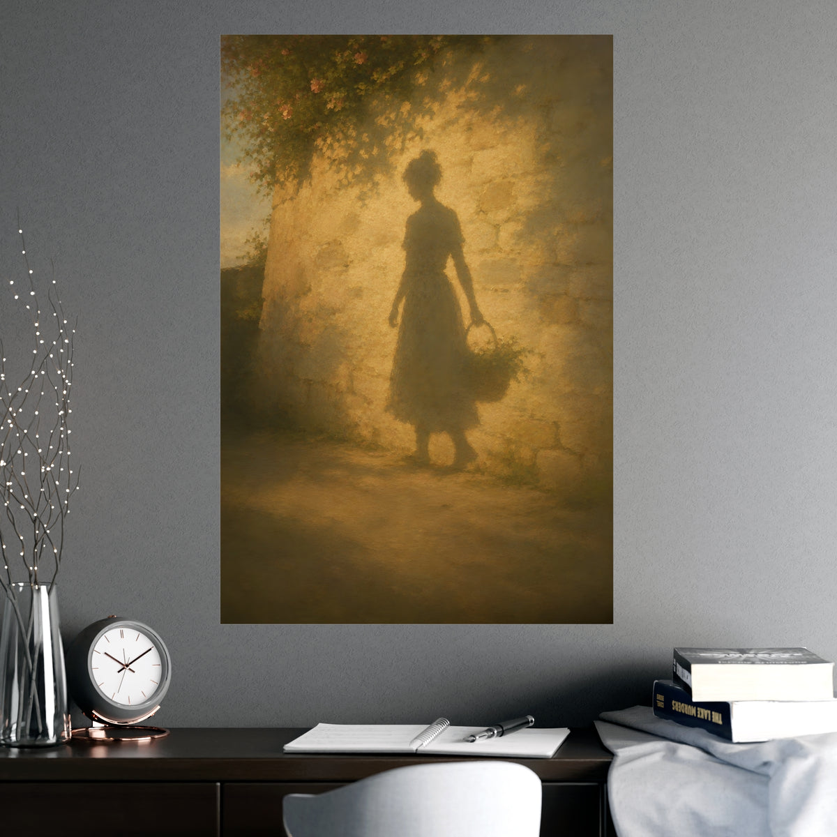 Her Shadow on the Wall — the long shadow of a woman carrying a basket, cast across a sunlit stone wall, shown framed on a wal