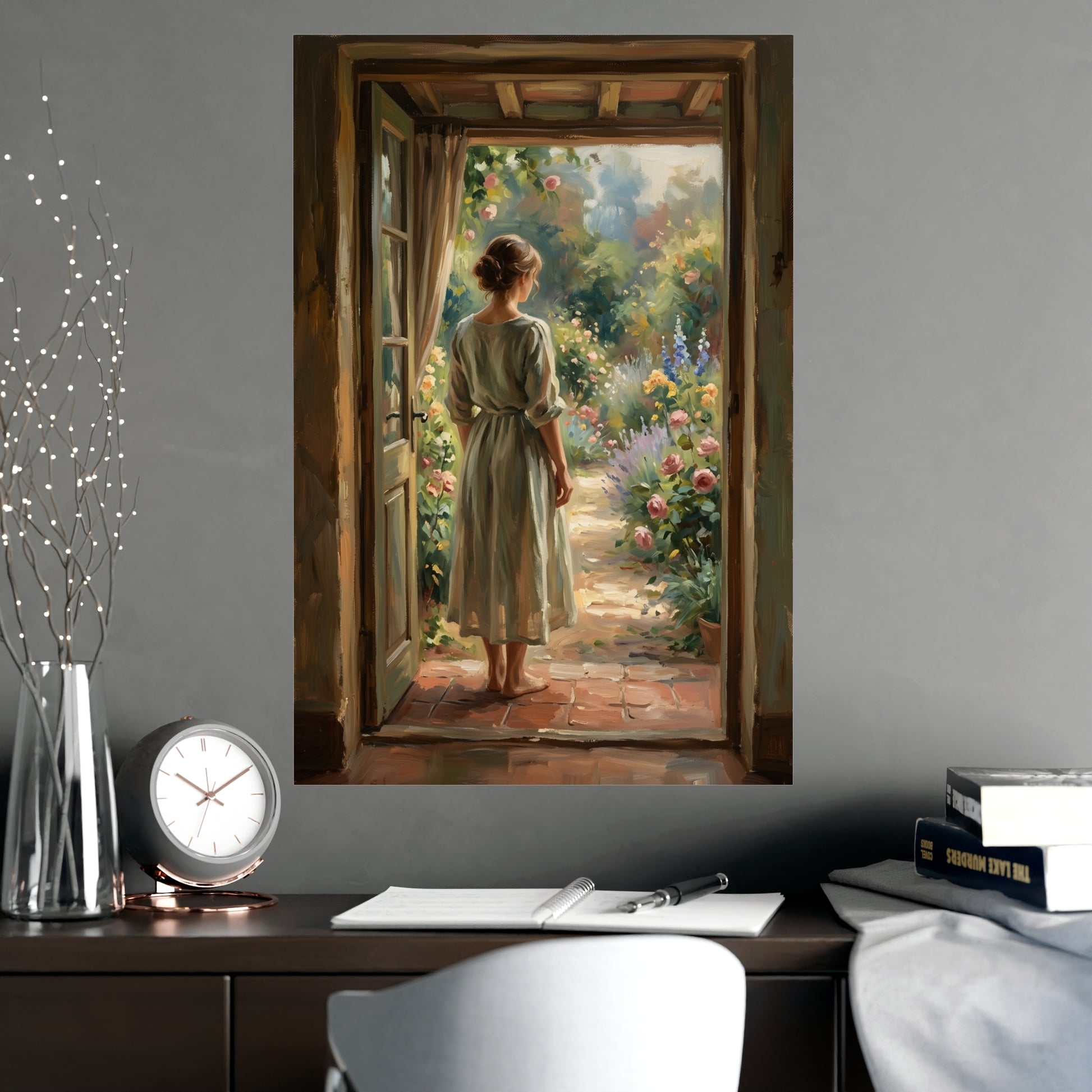 Doorway to the Garden hung above a desk with a clock and notebook, 20x30 in print