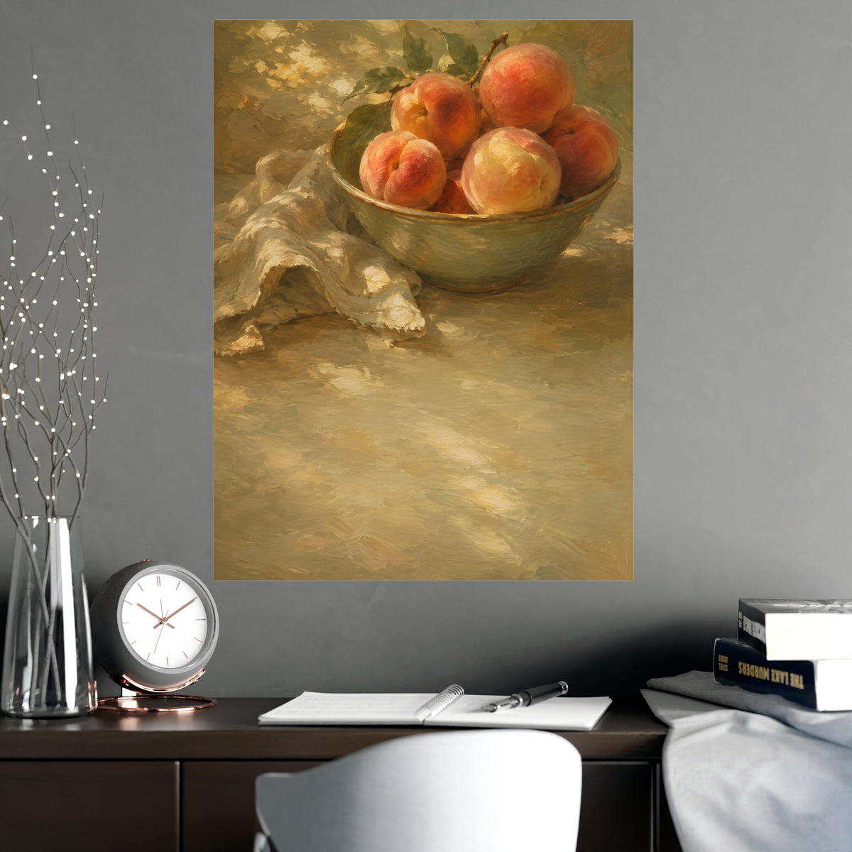 Bowl of Peaches — a bowl of ripe peaches and a folded linen napkin on a sunlit table, shown framed on a wall