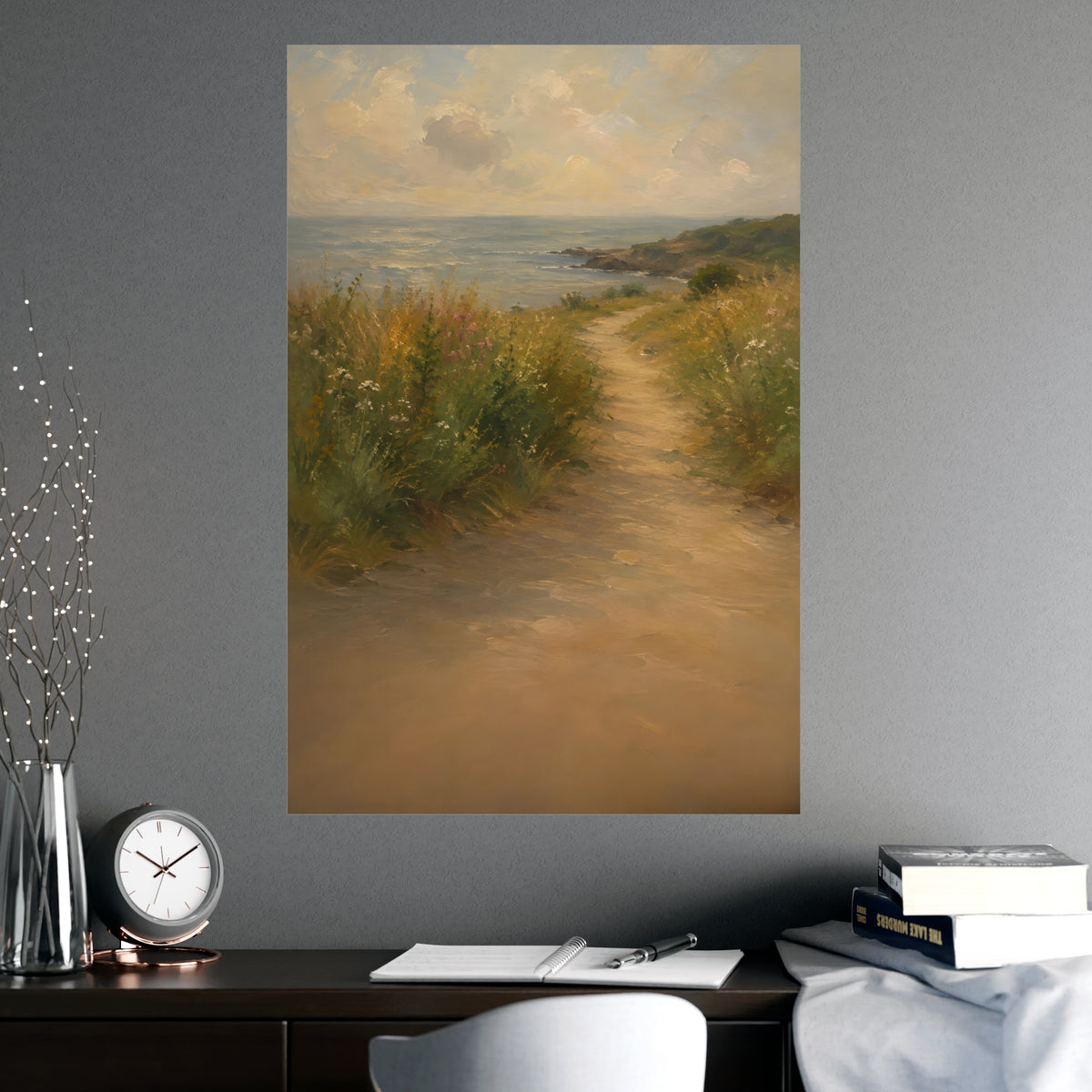 Coast Path — a sandy path through wild grasses and sea pinks with a calm sea beyond, shown framed on a wall