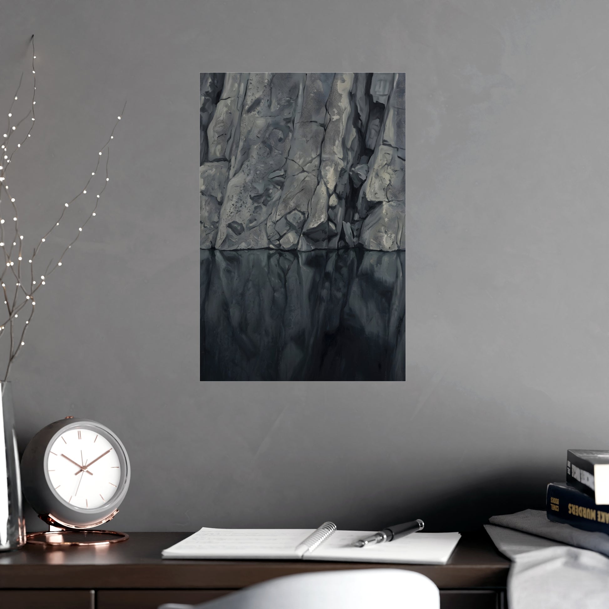 Still Water hung above a desk with a clock and notebook, 12x18 in print