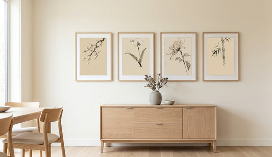 Four Gentlemen ink set of 4 — plum, orchid, chrysanthemum and bamboo hung in a row above an oak sideboard on a cream wall